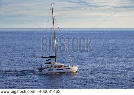 Sailingboat In The Adriatic Sea By The Shore Of Croatia