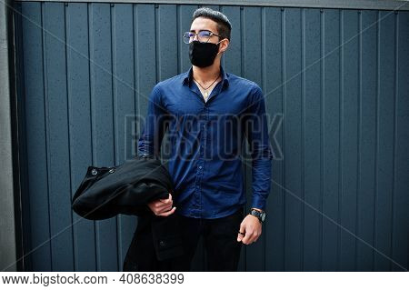 Middle Eastern Entrepreneur Wear Black Face Mask And Eyeglasses. New Normal Life After Coronavirus P