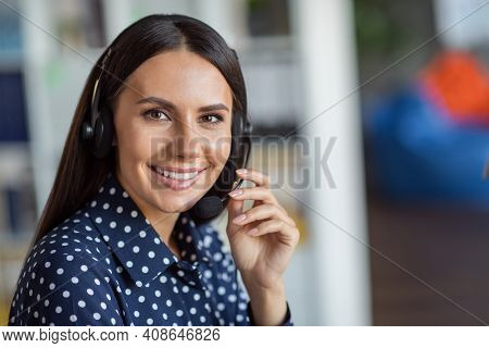 Portrait Of Young Beautiful Attractive Smiling Cheerful Good Mood Businesswoman In Headphones Workin