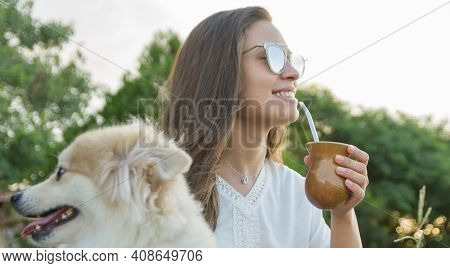 Blonde Woman Taking Traditional Gaucho Chimarrao