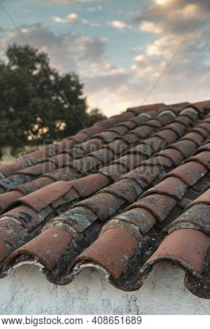 Roof Of A Farm In The Middle Of The Countryside Of The Sierra Of Cordoba Andalusia At Sunset