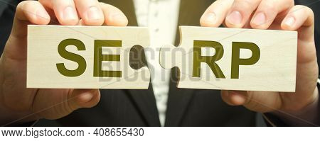 Wooden Puzzles With The Word Serp - Search Engine Results Page. Pages Displayed By Search Engines In