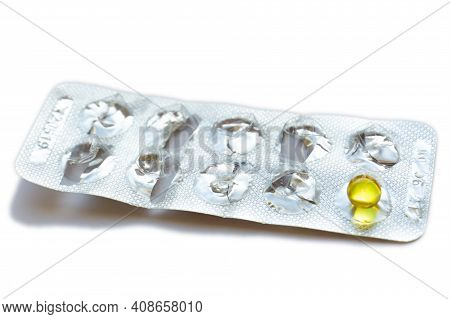 There Is One Tablet Left In The Blister Pack. Round Yellow Pill In A Blister Pack. Almost Empty Blis