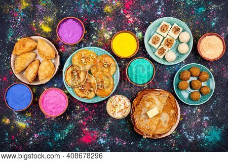 Food For Indian Holi Party. Laddu, Gujiya, Puran Poly, Thandai, Malpua And Burfi