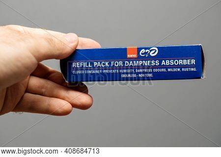 Paris, France - May 3, 2020: Pov Male Hand Holding Package With Dampness Absorber Refill Pack Manufa
