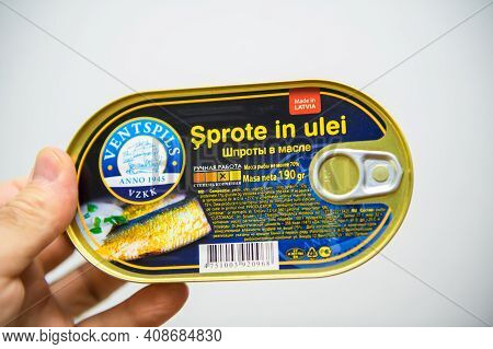 Paris, France - May 6, 2020: Pov Male Hand Holding Package With Sprote In Ulei - Translated As Sprat