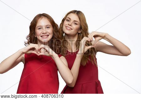 Mom And Daughter Red Dress Hug Family Joy Friendship