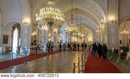 Tehran, Iran - May 2019: Tourists Visiting Talar-e Salam Or Reception Hall Of Golestan Palace, Decor