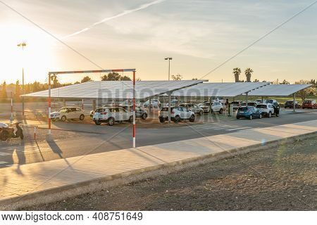 Campos, Spain; February 16 2021: Parking Lot Of The Sports Complex In The Town Of Campos At Sunset, 