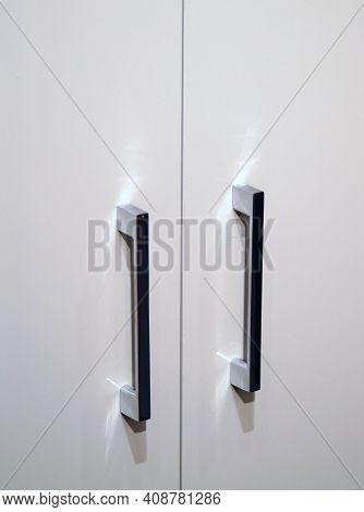 Close-up View Of Metal Handles Of Closed Cabinet ,interior Decoraton Concept
