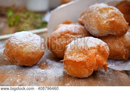 Doughnuts Beignet With Sugar Powder And Jam On The Wooden Table