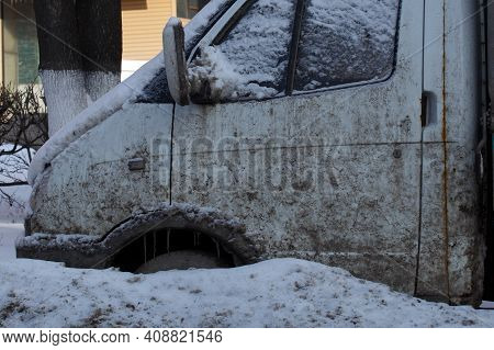 Small Dirty Semitruck Freezed In The Snowdrift