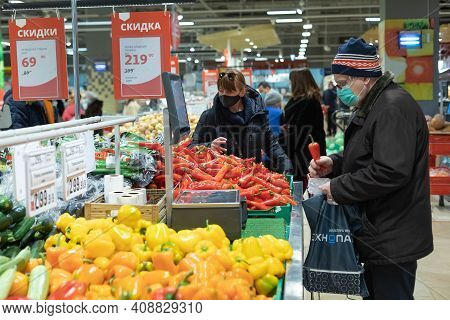 15.02.2021, Russia, Moscow. A Major Supermarket Ashan. Senior Buyer Chooses Vegetables.