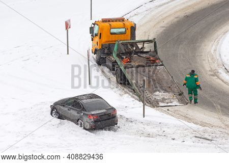 Car Accident Flipped Upside Down In Accident During Winter Storm. The Danger Of Driving In Winter. A