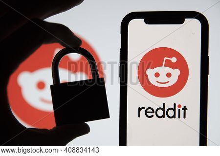 London, Uk - February 2021: Reddit Logo Displayed On A Smartphone With Padlock