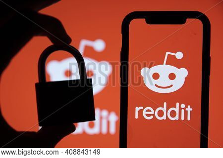 London, Uk - February 2021: Reddit Logo Displayed On A Smartphone With Padlock