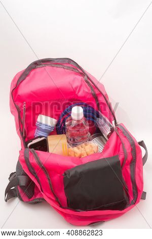 Disaster Prevention Goods In A Pink Rucksack In Vertical Composition
