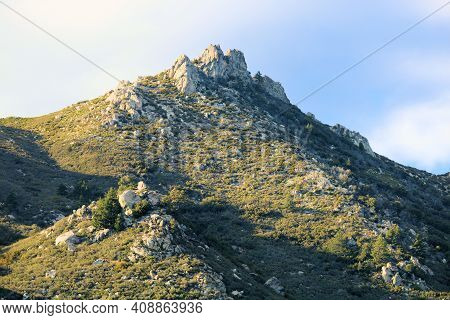Mountain Peak With Rocky Crags Covered With Chaparral Plants Taken At A Chaparral Woodland In The Ru