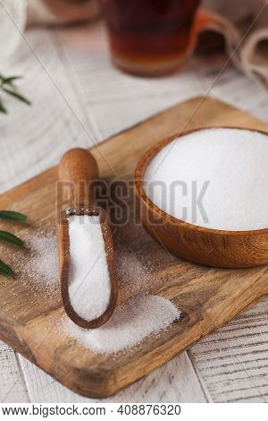 Natural Sweetener In A Wooden Spoon. Sugar Substitute. Erythritol