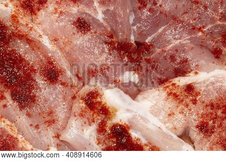Thinly Sliced Raw Meat In A Marinade With Red Pepper.raw Meat In Sliced Background.thin Sliced Meat 