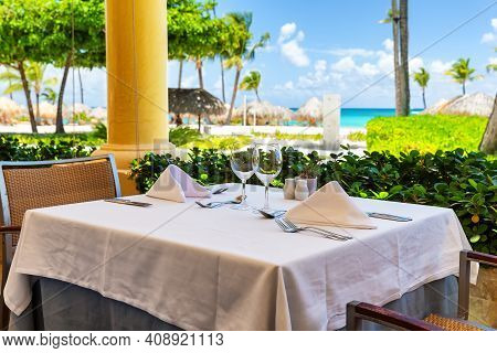 Outdoor Restaurant At The White Sand Beach In Luxery Hotel In Punta Cana, Dominican Republic.  Beaut