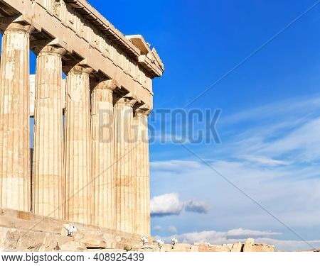 Parthenon Temple On A Sinset. Acropolis In Athens, Greece. The Parthenon Is A Temple On The Athenian