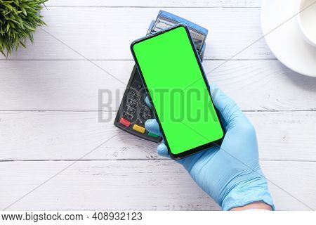 Hand In Latex Gloves Contactless Payment With Smart Phone