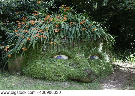 Saint Austell (england), Uk - August 19, 2015: A Statue In The Lost Gardens Of Heligan, Cornwall, En