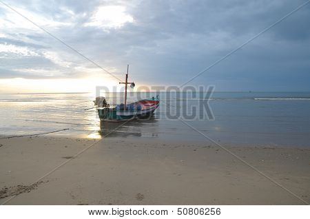 Fishing Boat On The Shore At Low Tide.