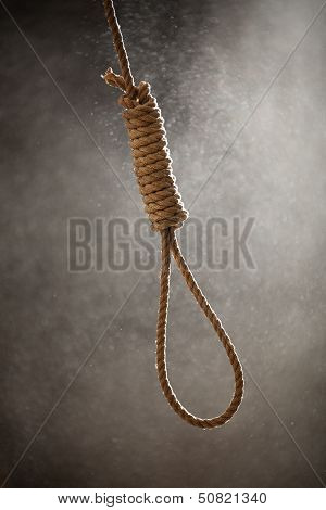 Hangman Noose With Thirteen Loops On A Dusty Background