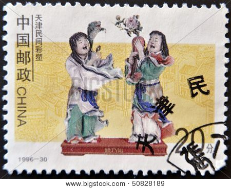 Japan - Circa 1996: A Stamp Printed In Japan Shows Two Human Figures Made Of Porcelain, Circa 1996