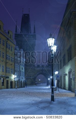 Czech Republic, Pague, Charles Bridge  tower in snowfall