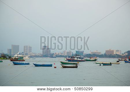 Small Boat Moored At Sea
