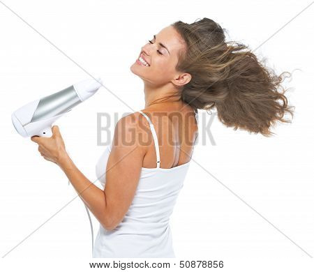 Happy Young Woman Blow-dry