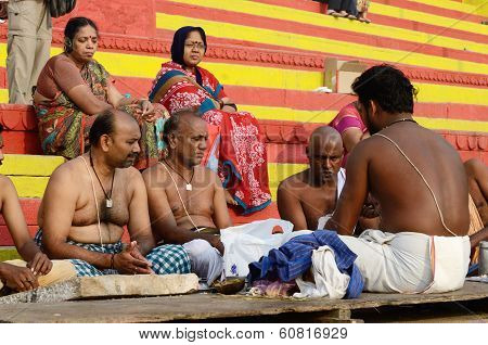 Brahmins (priests) perform puja - ritual ceremony at holy ghats,Varanasi,India