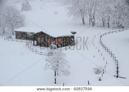 Mountain Chalets Made Of Wood Covered With Snow
