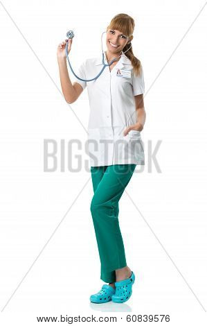 Smiling Doctor in white medical gown showing stetoscope