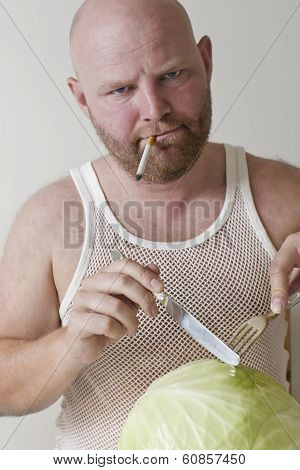 Smoking man eat cabbage and mushrooms