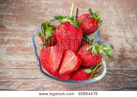 Fresh strawberries in a glass bowl