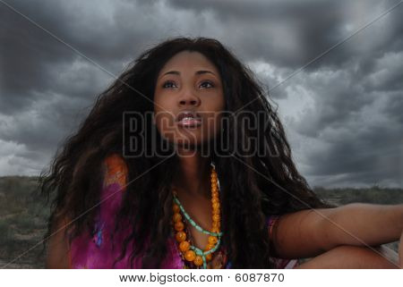 African American Woman Sits In The Safari