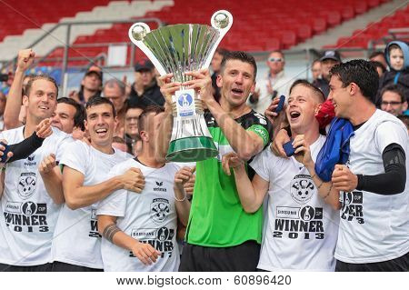 VIENNA,  AUSTRIA - MAY 30 avorin Kablar (#21 Pasching) and his team celebrate their win in the Austrian cup final game on May 30, 2013 in Vienna, Austria.