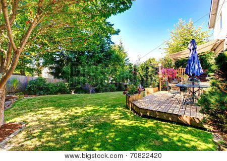 Walkout Deck With Patio Table And Umbrella