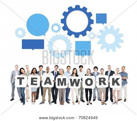 Group of Multi-Ethnic Business People Holding Letters To Form Teamwork And Speech Bubbles With Gears Above