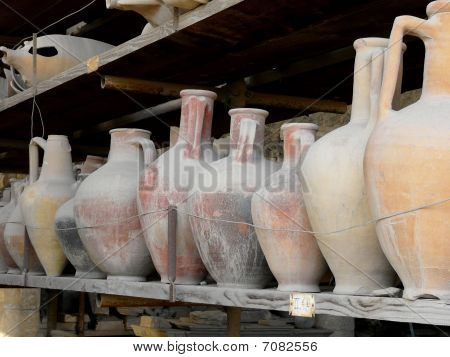Row of amphorae at the ancient Roman city of Pompeii, Italy