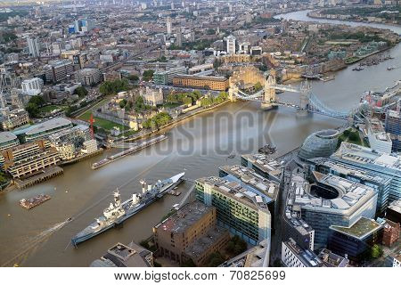 Aerial view of battleship docked in the river Thames