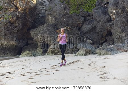 Beautiful Girl Running On The Beach