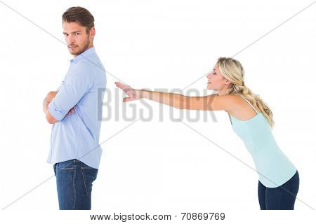 Desperate blonde reaching for boyfriend on white background