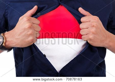 Young Sport Fan Opening His Shirt And Showing The Flag Of Monaco Principality, Monacan Flag