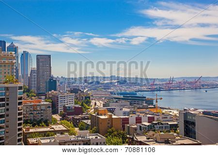 Panoramic View Of Seattle Downtown And Mountain Rainer Looming Over The Skyline