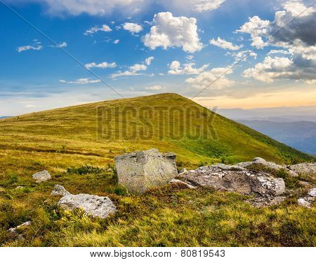 White Boulders On The Hillside At Sunrise